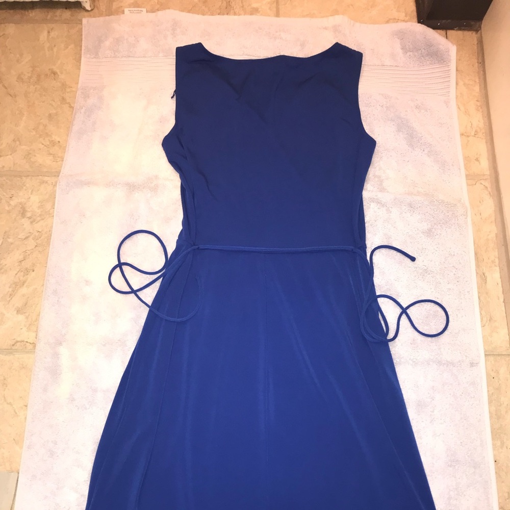 Blue dress with ruffles on bottom